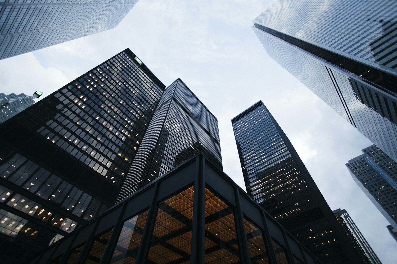 Upward perspective of a glass office building
